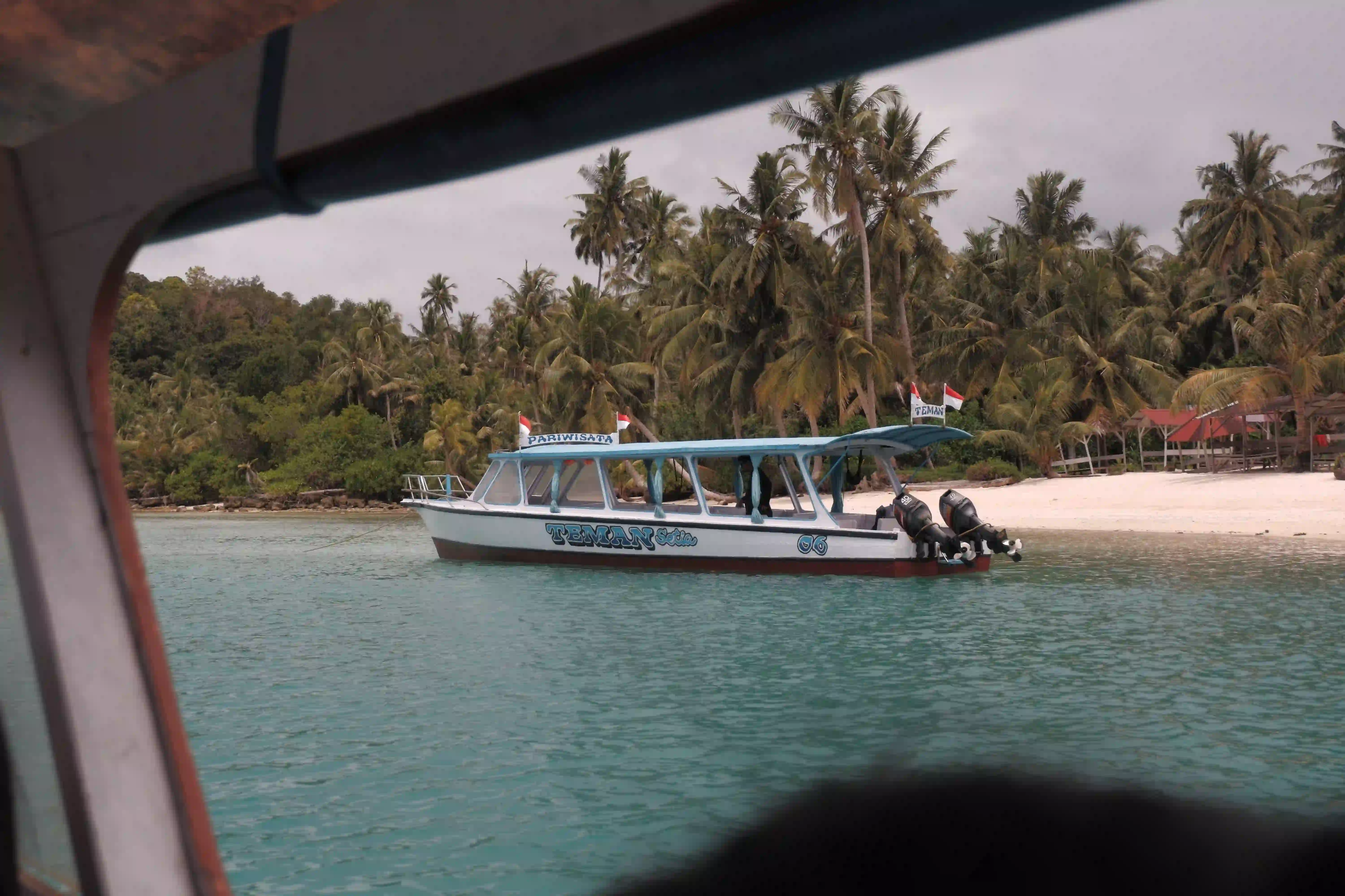 Tour boats crossing the waters of Sibolga